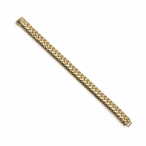 Tiffany and Co Vannerie 18ct Yellow Gold Bracelet; comprised of a domed lattice design in 18ct yellow gold, with a folding clasp. Stamped Tiffany & Co., 750, 1995