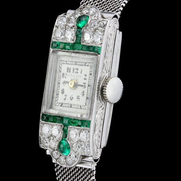 Drecier and Co Art Deco Platinum Manual Watch with Emeralds and Old Cut Diamonds