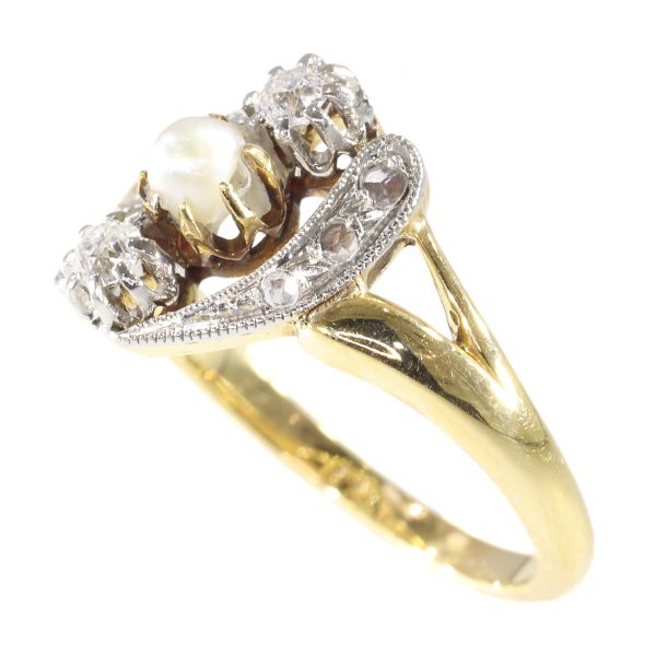 antique Edwardian diamond and pearl engagement ring