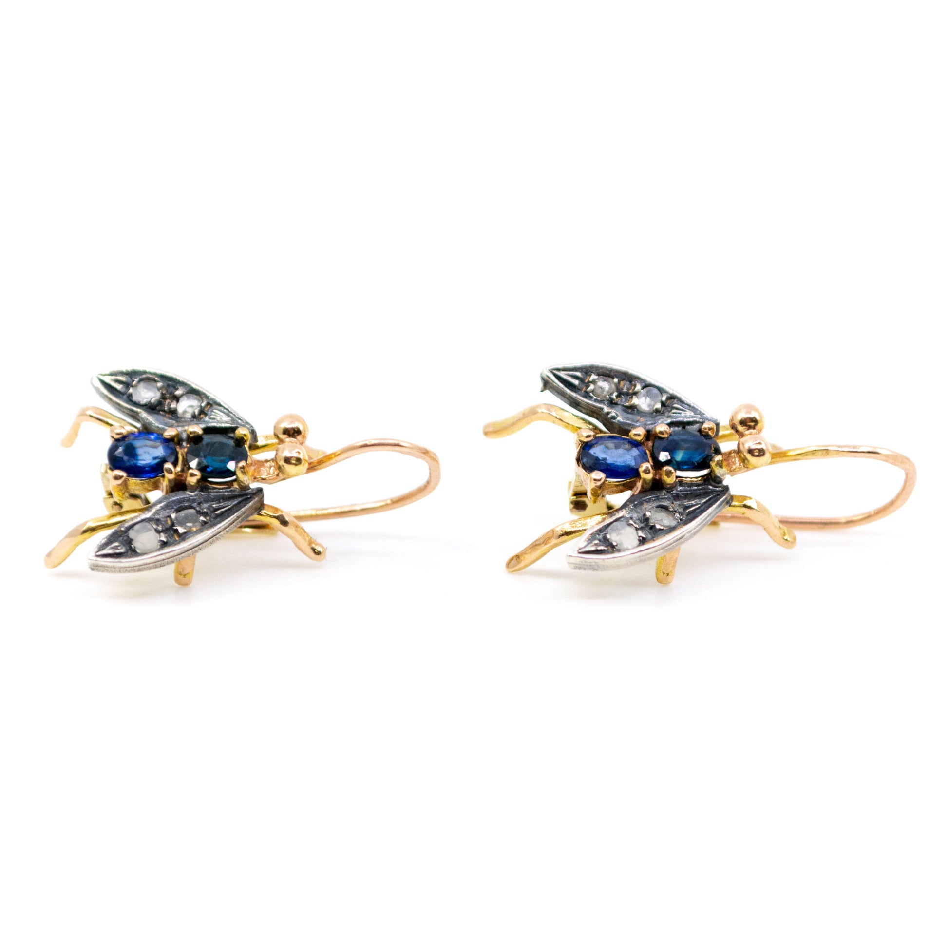 A pair of insect earrings in yellow gold and silver with sapphires and diamonds