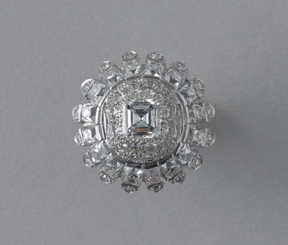 Vintage 10ct Diamond and Platinum Domed Cluster Bombe Cocktail Ring; set with carré, brilliant, French and single-cut diamonds, 10.00 carat total, Circa 1950s
