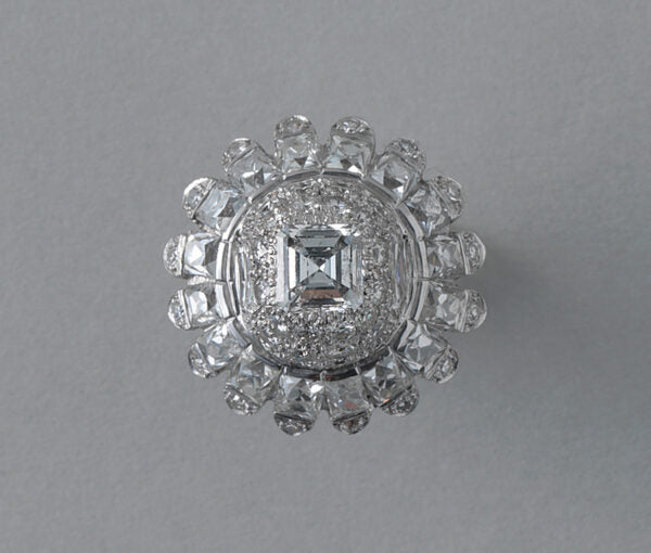 Vintage 10ct Diamond and Platinum Domed Cluster Bombe Cocktail Ring; set with carré, brilliant, French and single-cut diamonds, 10.00 carat total, Circa 1950s