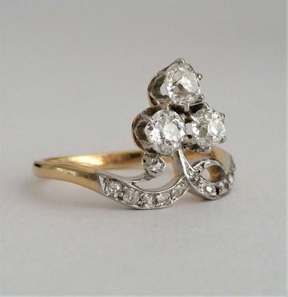 Antique Edwardian Old Cut Diamond Trefoil Cluster Ring; 'Duchesse' ring, with three old cut diamonds, 0.20cts each, rose-cut diamond accents