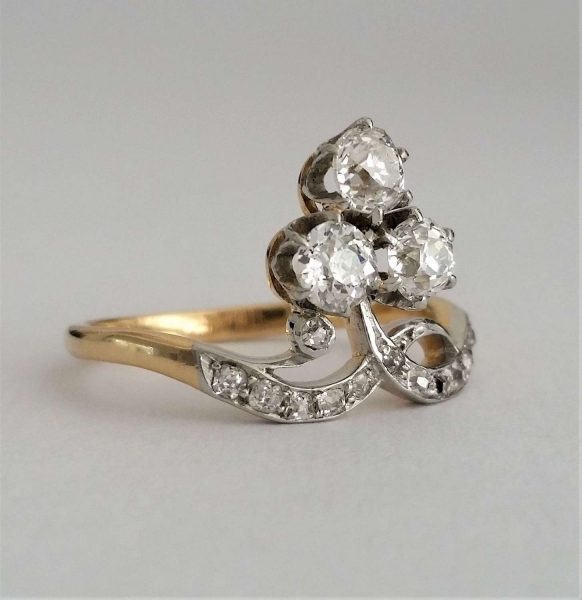 Antique Edwardian Old Cut Diamond Trefoil Cluster Ring; 'Duchesse' ring, with three old cut diamonds, 0.20cts each, rose-cut diamond accents
