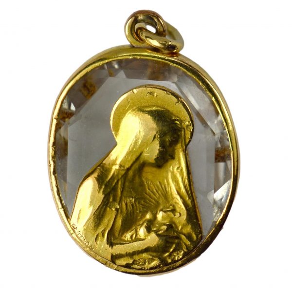 Rock Crystal and 18ct Gold Madonna and Child Charm Pendant; oval faceted rock crystal in a gold frame, with an inset gold plaque depicting the Madonna and child, Signed G. Vernon and numbered 45174