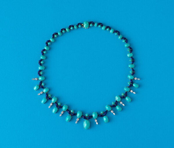 Vintage Turquoise, Diamond and Enamel Fringe Necklace; set with oval and round cabochon cut turquoises, accented with by dark blue translucent enamel leaves and 1.55cts brilliant cut diamonds, in 18ct gold, Circa 1960