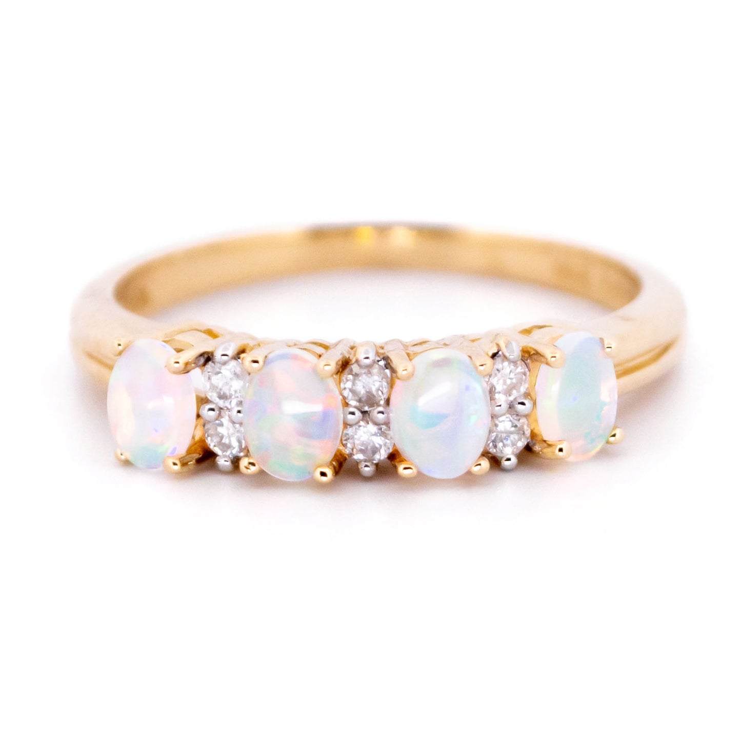 Diamond and Opal Four Stone Eternity Ring in Yellow gold