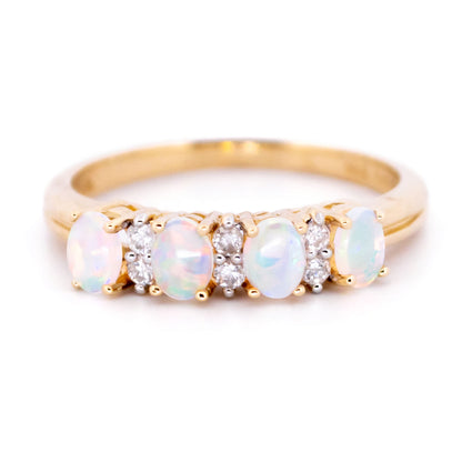 Diamond and Opal Four Stone Eternity Ring in Yellow gold