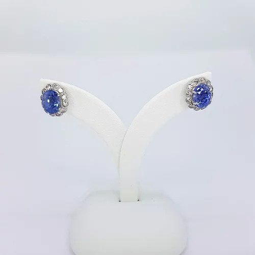 Sapphire and Diamond Oval Cluster Earrings; 2.00cts oval faceted sapphires, surrounded by brilliant-cut diamonds, in 18ct white gold