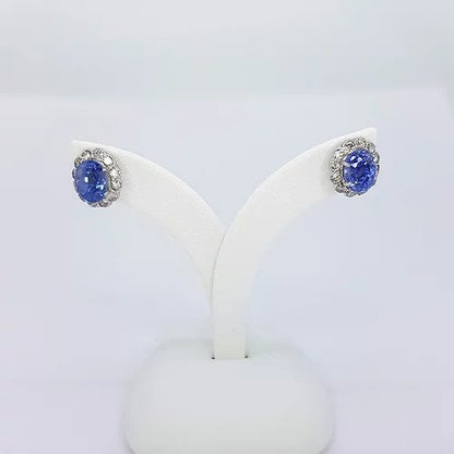 Sapphire and Diamond Oval Cluster Earrings; 2.00cts oval faceted sapphires, surrounded by brilliant-cut diamonds, in 18ct white gold