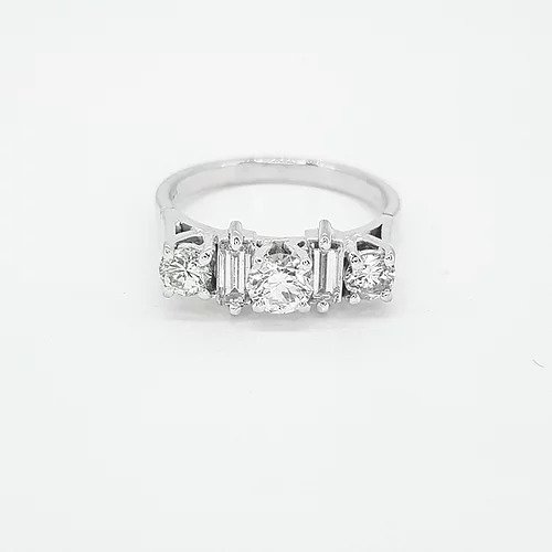 Brilliant and Baguette Cut Diamond Five Stone Ring; three round brilliant-cut diamonds alternated with two baguette-cut diamonds, 0.75 carats, in 18ct white gold