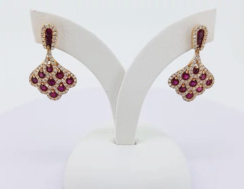 Ruby and Diamond Cluster Drop Earrings; set with 1.50cts rubies encompassed by 0.70cts diamonds, in the shape of a fan, 18ct yellow gold.