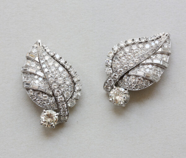 Art Deco Diamond Set Leaf Earrings; pair of platinum and white gold earrings in the shape of leaves set with 5cts baguette and brilliant-cut diamonds