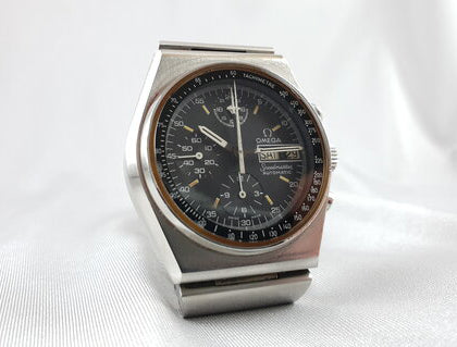 Vintage 1970's Omega Speedmaster 40mm Automatic Chronograph Steel Watch; black dial, protected by mineral crystal, bar-style steel bracelet strap