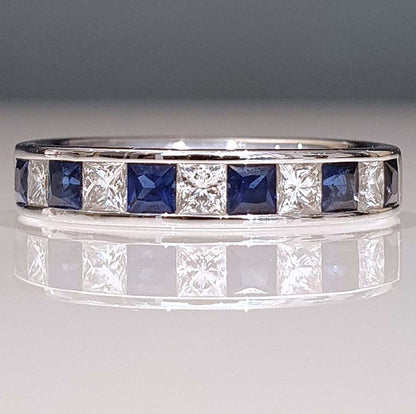Princess Cut Diamond Sapphire and Diamond Half Eternity Ring, 11 alternating princess-cut diamonds and sapphires in 18ct white gold band