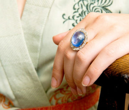 Antique Edwardian 16ct Cabochon Cut Sapphire and Rose-Cut Diamond Oval Cluster Ring