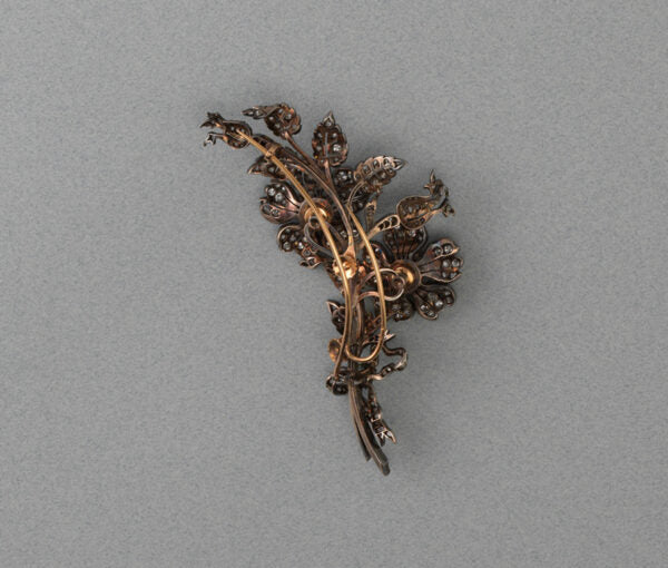 Antique Victorian 3ct Old Cut Diamond Rose Flower Brooch; a bouquet of roses with bow detail, set with 3.00 carats old-cut diamonds, set in silver and gold.