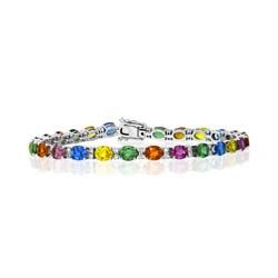 13.44ct Oval Fancy Rainbow Sapphire Line Bracelet, 13.44cts oval-cut rainbow coloured orange, yellow, green, pink/purple, and blue sapphires linked by two sparkling diamonds between in 18ct white gold