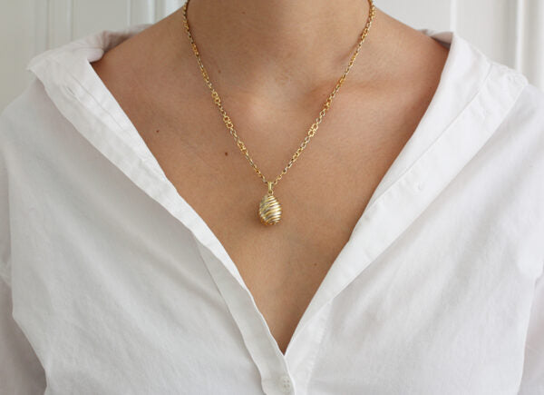 On Model Cartier Tri Colour Gold Fancy Link Chain with Pendant. Signed and numbered