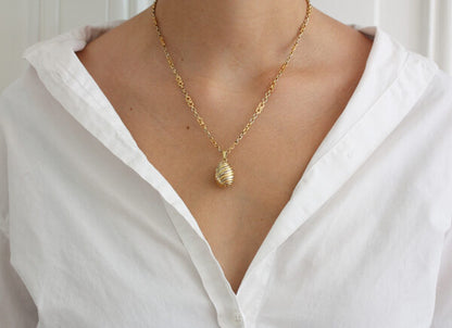 On Model Cartier Tri Colour Gold Fancy Link Chain with Pendant. Signed and numbered