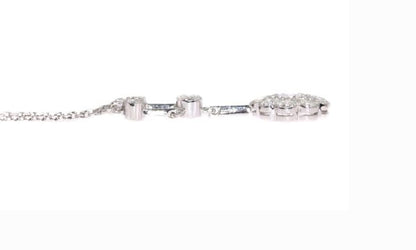 Vintage Art Deco Diamond and Platinum Flower Pendant Necklace, 1.10cts