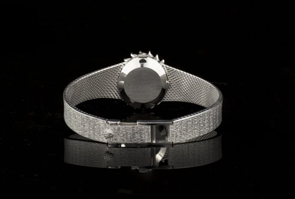 Vintage Rolex 18ct White Gold Manual Watch with Diamond Bezel; solid 18ct white gold manual winding watch with diamond decorated bezel in a sunburst design, Circa 1980s