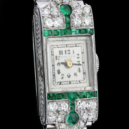 Drecier and Co Art Deco Platinum Manual Watch with Emeralds and Old Cut Diamonds