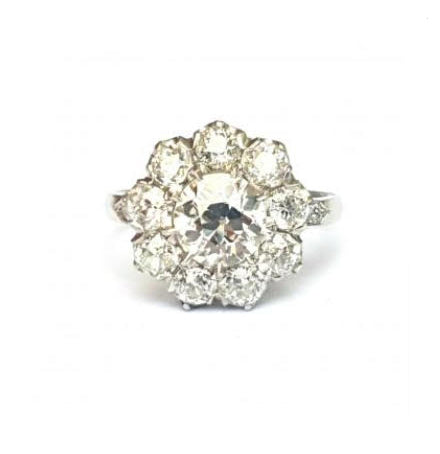 Old Cut Diamond Cluster Ring in Platinum; set with 3.50 carats of old cut diamonds, claw set with a low profile to the finger, colour H, clarity VS2