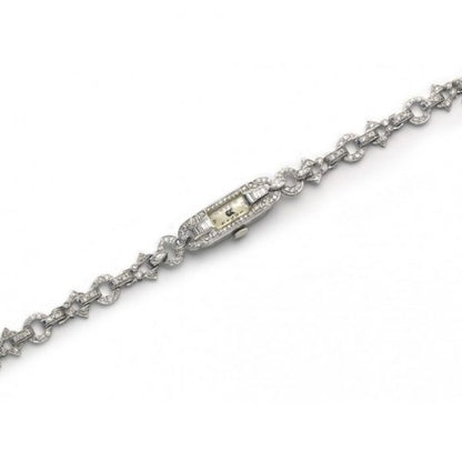 Art Deco Diamond and Platinum Cocktail Wristwatch; set with 6.00 carats of marquise, baguette and eight-cut diamonds to the case and bracelet, Circa 1925