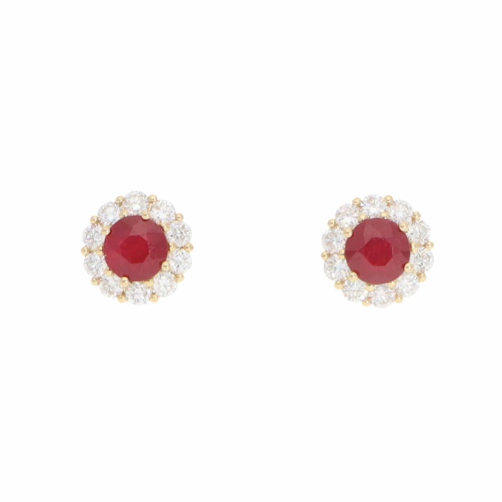 Ruby and diamond earrings in gold.