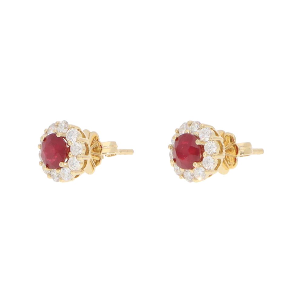 Ruby and diamond earrings in gold.