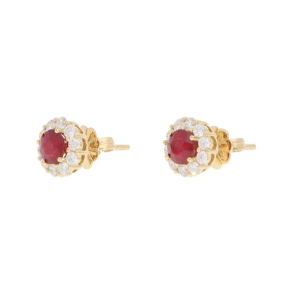 Ruby and diamond earrings in gold.