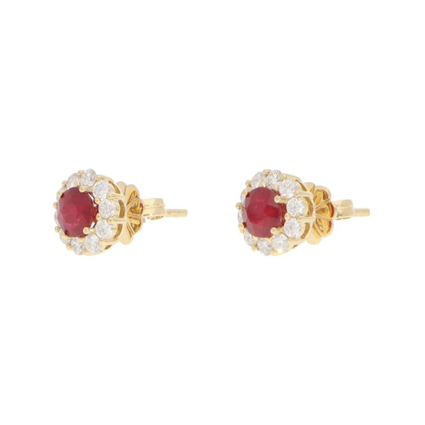 Ruby and diamond earrings in gold.