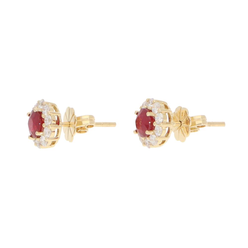 Ruby and diamond earrings in gold.
