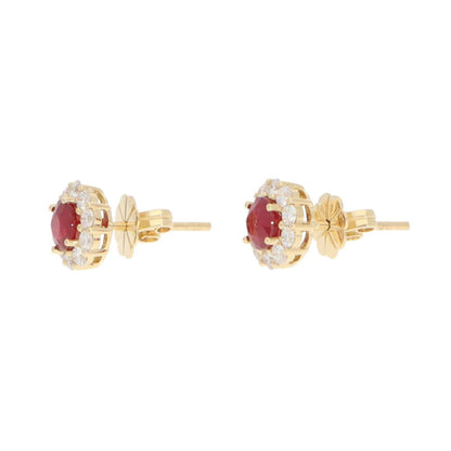 Ruby and diamond earrings in gold.
