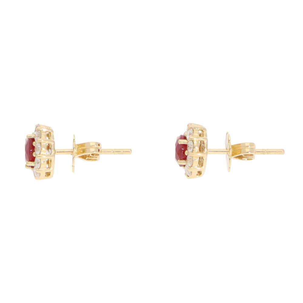 Ruby and diamond earrings in gold.