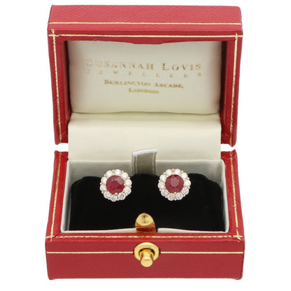 Ruby and diamond earrings in gold.