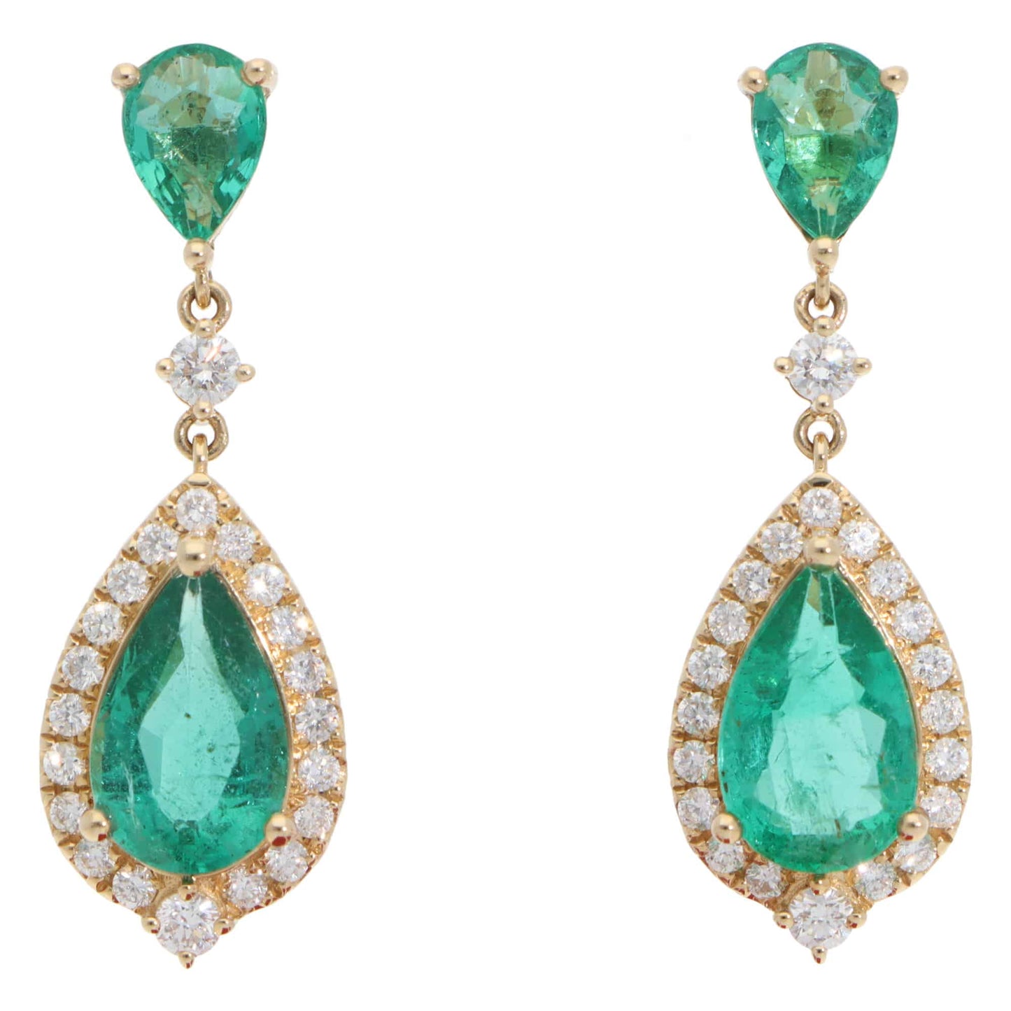 A pair of emerald and diamond cluster drop earrings in yellow gold, on a white background