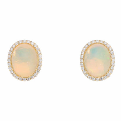Opal and diamond stud earrings in gold.
