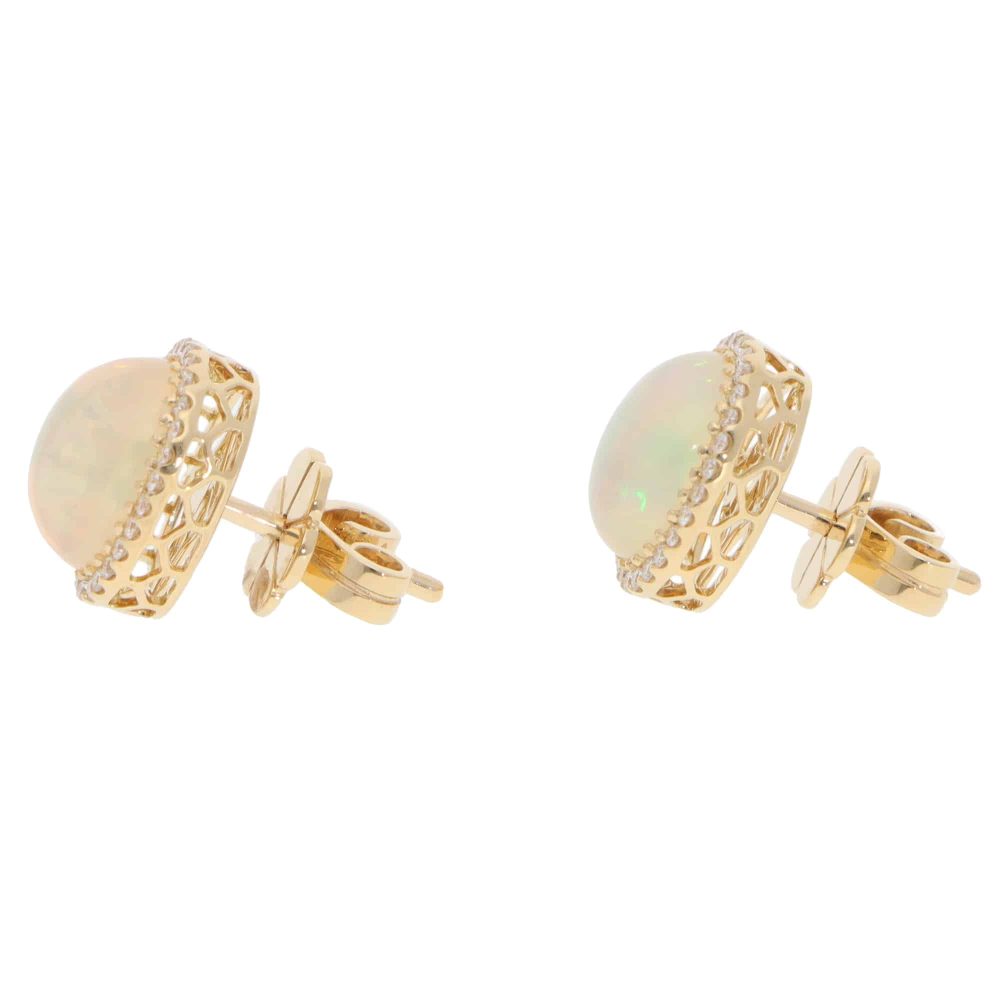 Opal and diamond stud earrings in gold.