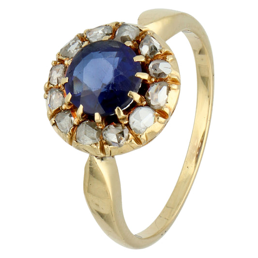 A sapphire and rose cut diamond ring in yellow gold