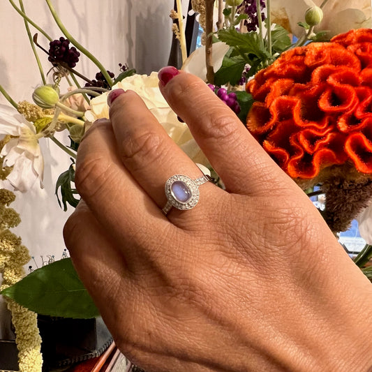 Platinum, Moonstone and Diamond Oval Cluster Ring, 0.70 Carat