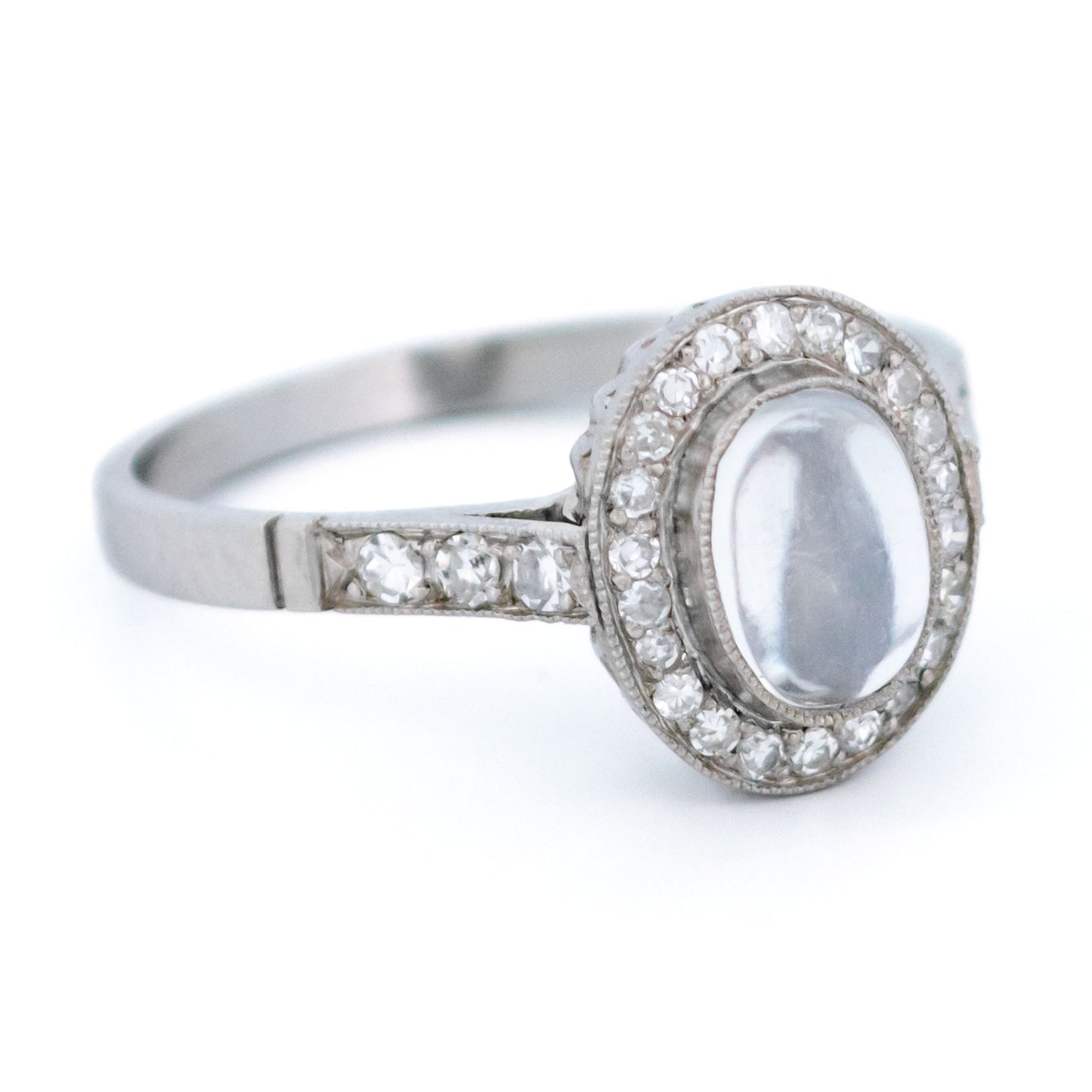 Platinum, Moonstone and Diamond Oval Cluster Ring, 0.70 Carat