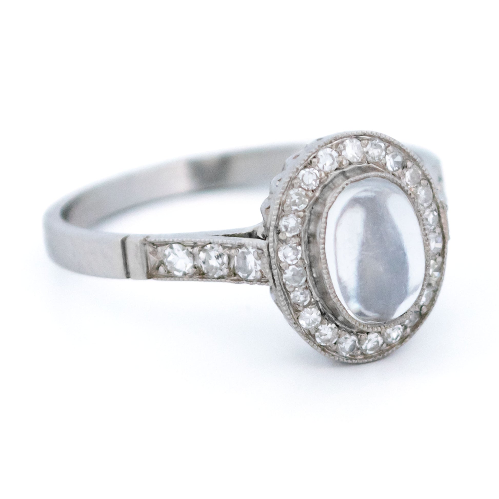 Platinum, Moonstone and Diamond Oval Cluster Ring, 0.70 Carat