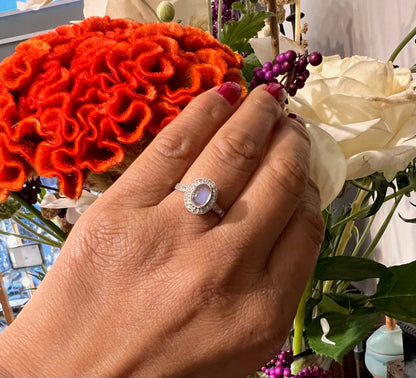 Platinum, Moonstone and Diamond Oval Cluster Ring, 0.70 Carat