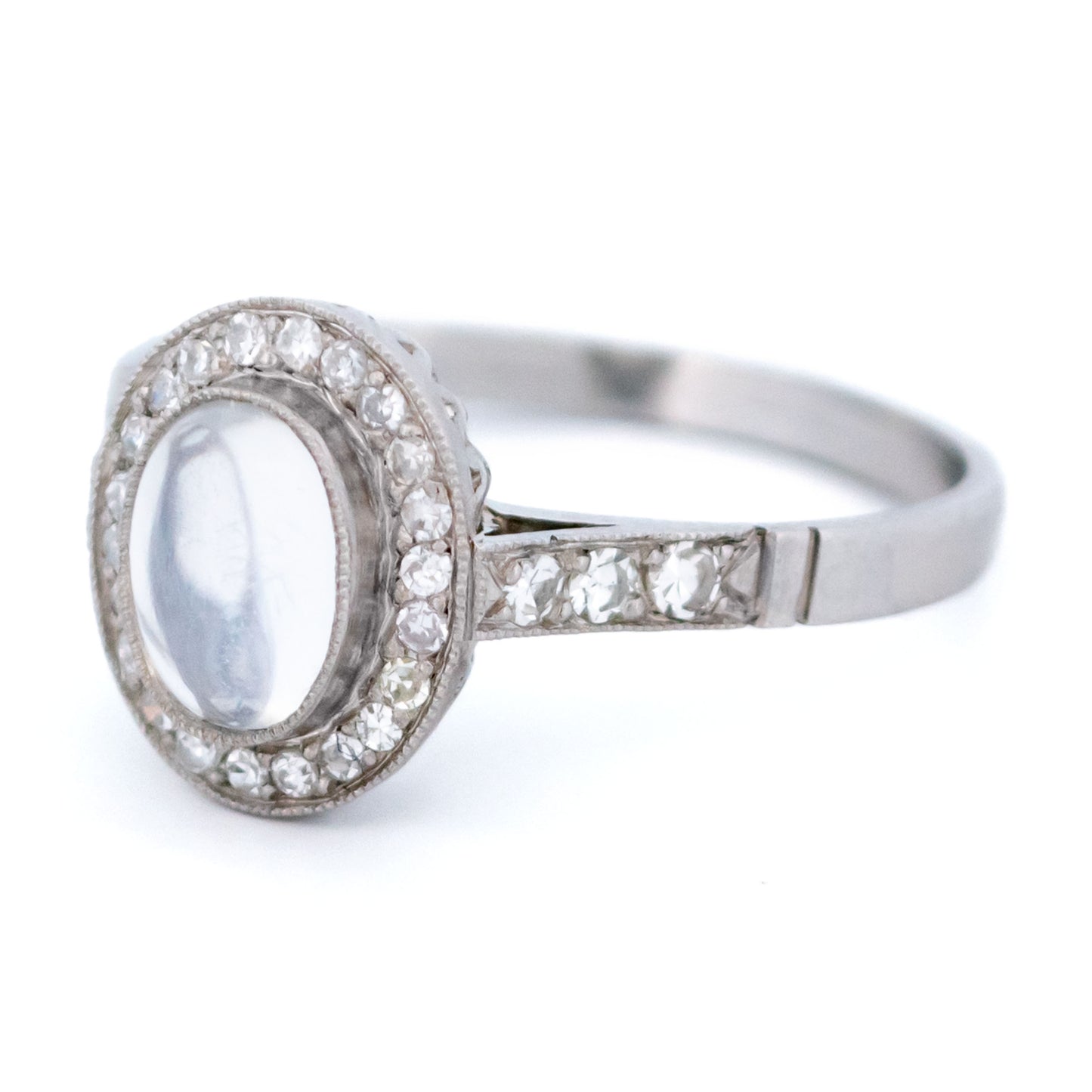 Platinum, Moonstone and Diamond Oval Cluster Ring, 0.70 Carat