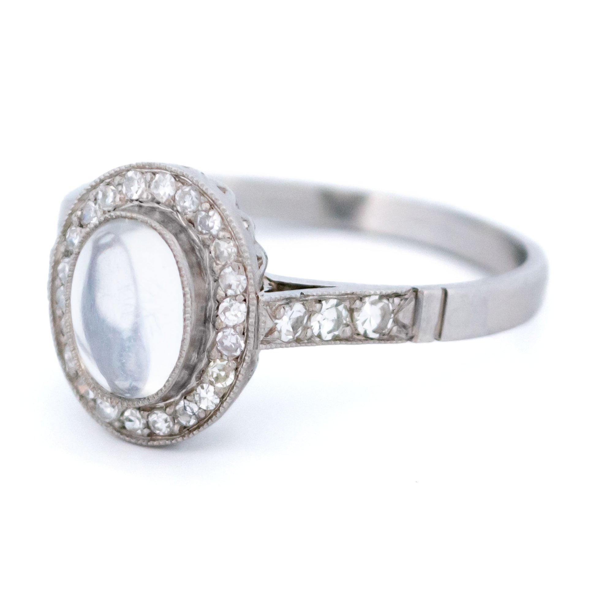 Platinum, Moonstone and Diamond Oval Cluster Ring, 0.70 Carat
