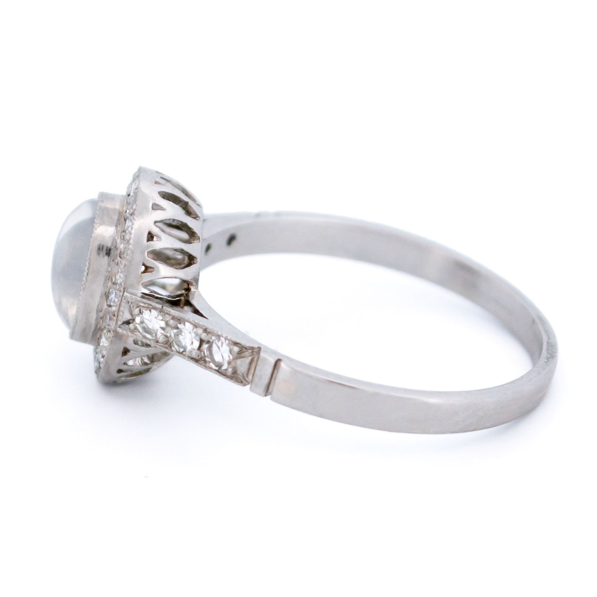 Platinum, Moonstone and Diamond Oval Cluster Ring, 0.70 Carat