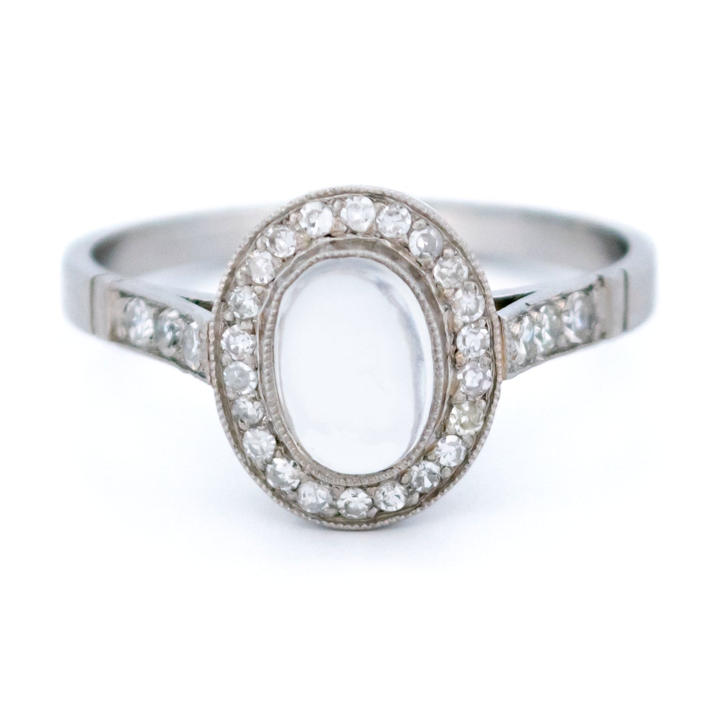 Platinum, Moonstone and Diamond Oval Cluster Ring, 0.70 Carat