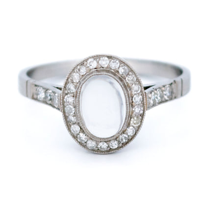 Platinum, Moonstone and Diamond Oval Cluster Ring, 0.70 Carat